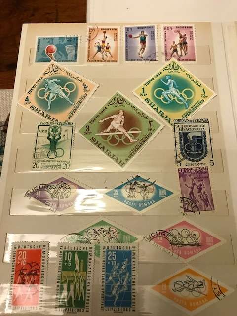 Book with collection of 286 Olympic games stamps