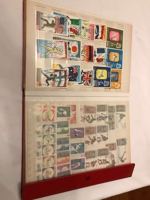 Book with collection of 286 Olympic games stamps