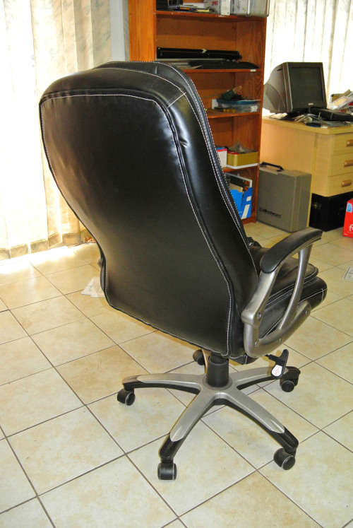 Comfortable Office Chair tilts and swivels on casters in good condition