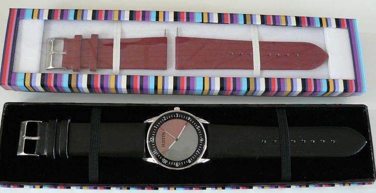 Justin watch with genuine leather strap **PLUS A FREE SET OF STRAPS!!**