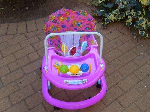 STUNNING!!!MUSICAL BABY WALKER WITH ADJUSTABLE HIGHT (COLOUR PINK )