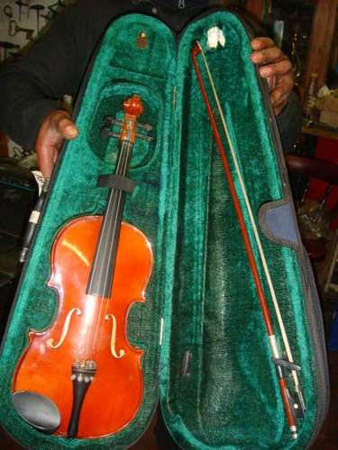 Violin with bow in case