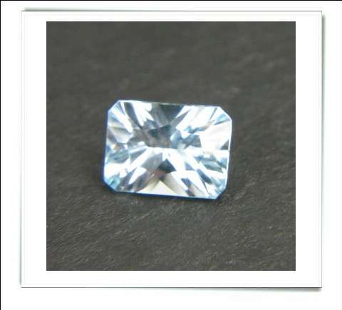 GEMZONE - Natural Aqua Blue Topaz Concave Octagon Facet - 1.57cts!