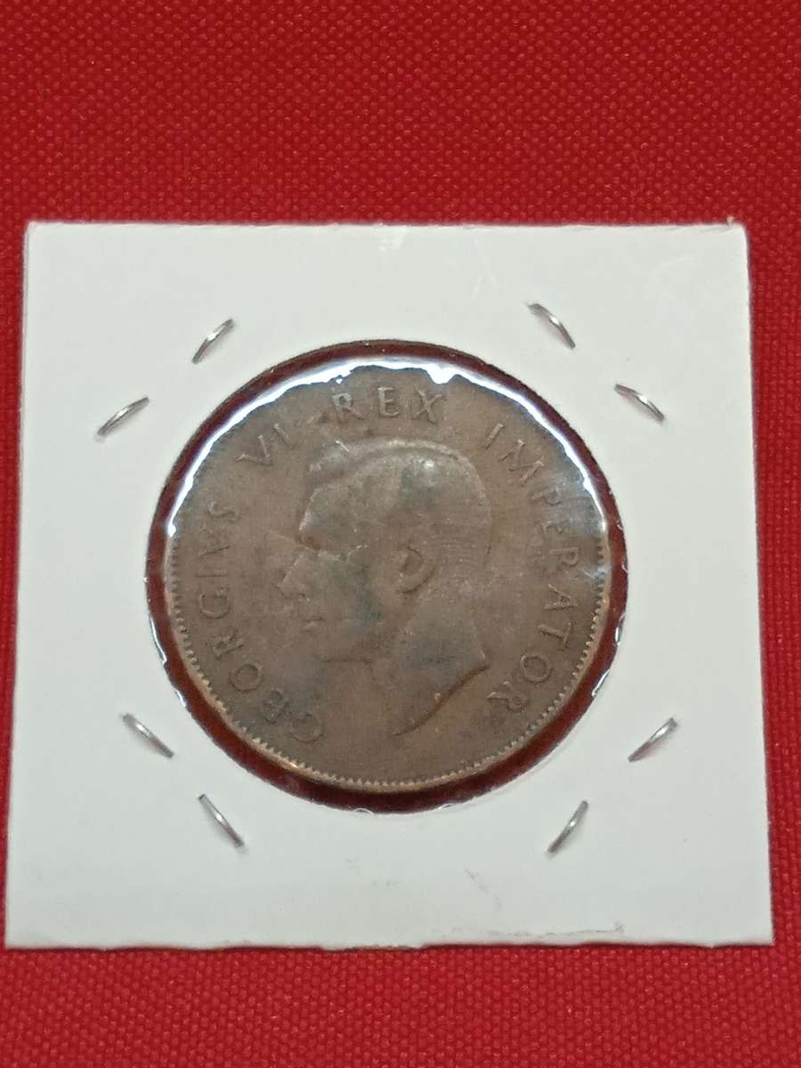 1942 PENNY IN COIN FLIP