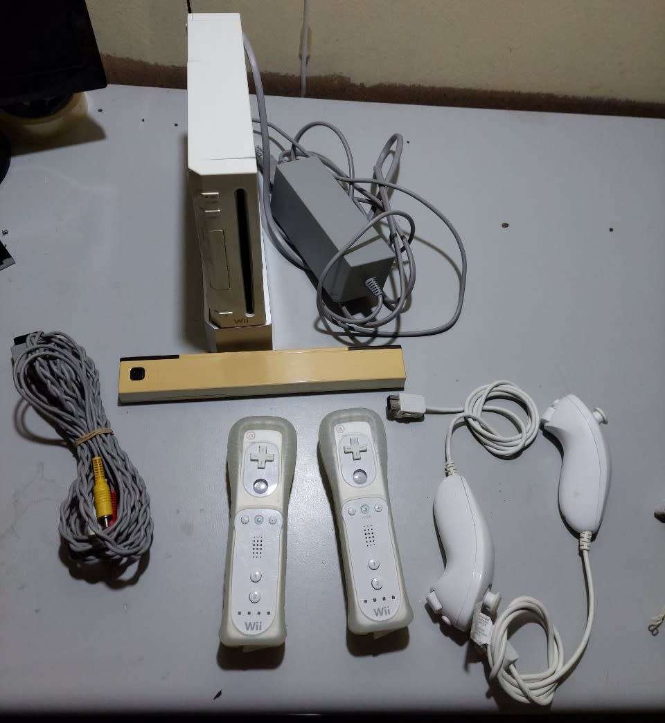 NINTENDO WII WITH CONSOLS,POWER CABLES etc