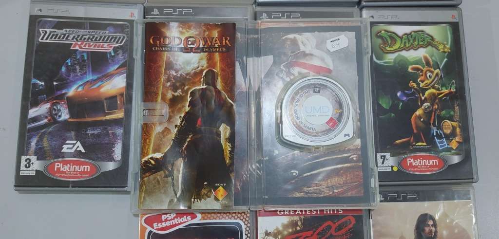 PSP (new battery) + 12 Games (most still have manuals)