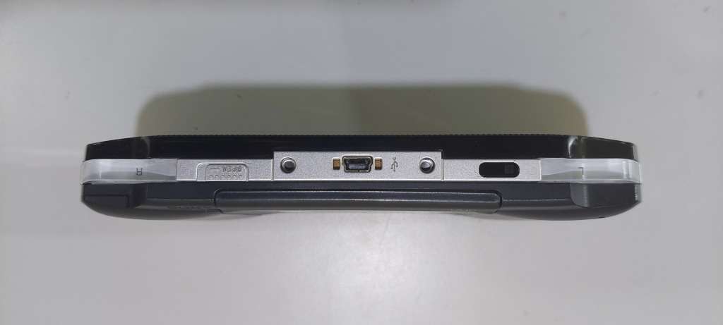 PSP (new battery) + 12 Games (most still have manuals)