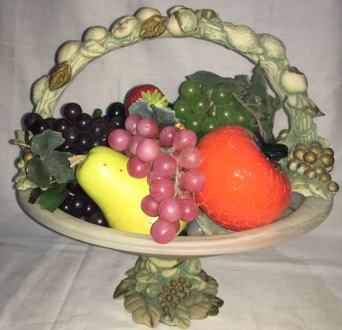 Fruit basket including glass faux fruit