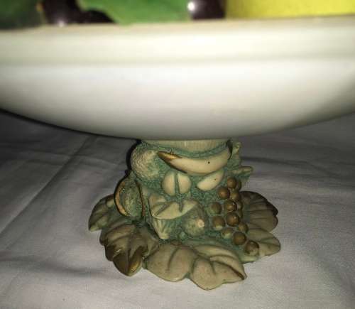 Fruit basket including glass faux fruit