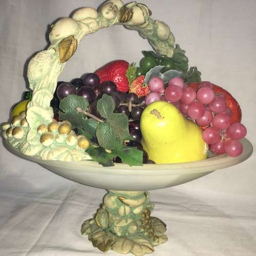 Fruit basket including glass faux fruit
