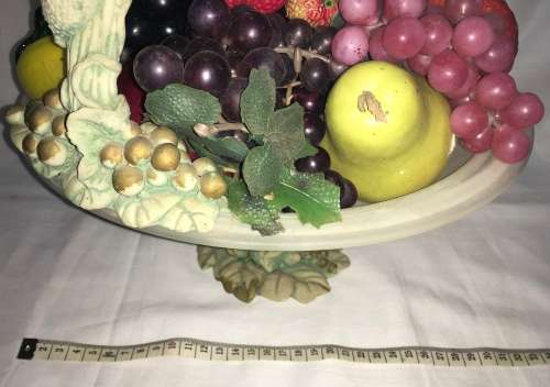 Fruit basket including glass faux fruit