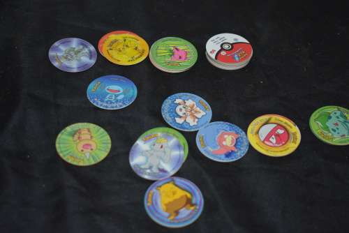 34 Assorted Pokemon Tazo's