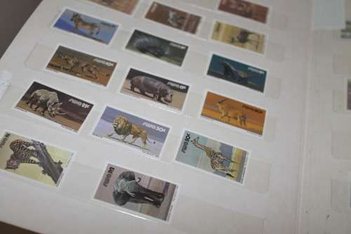 300 Stamps in A5 book on SWA