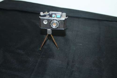 Mini Spy Camera Lighter on tri pod