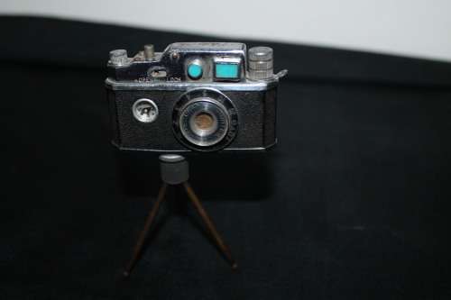 Mini Spy Camera Lighter on tri pod