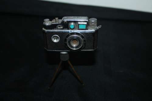 Mini Spy Camera Lighter on tri pod