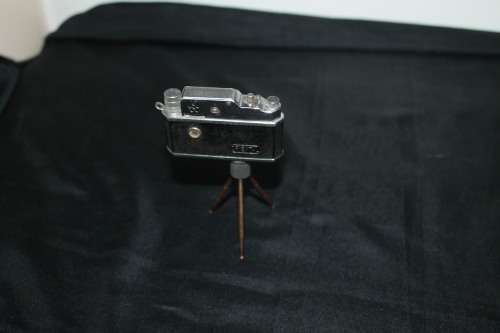 Mini Spy Camera Lighter on tri pod