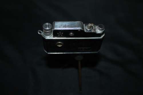 Mini Spy Camera Lighter on tri pod
