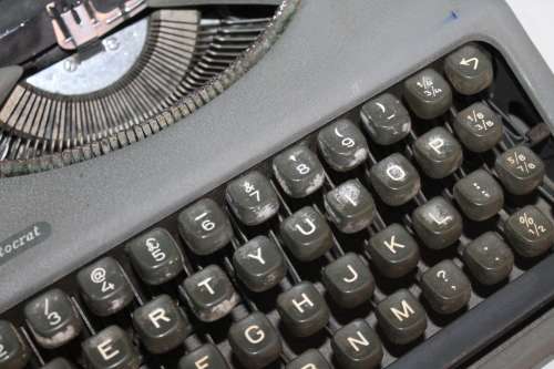 Typewriter in metal case