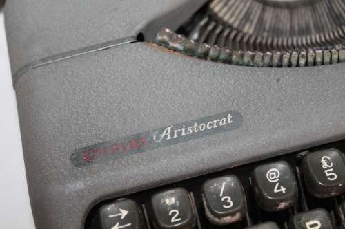 Typewriter in metal case