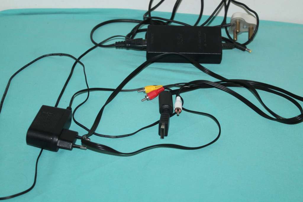 Playstation 2 Slim with 4 games and controller