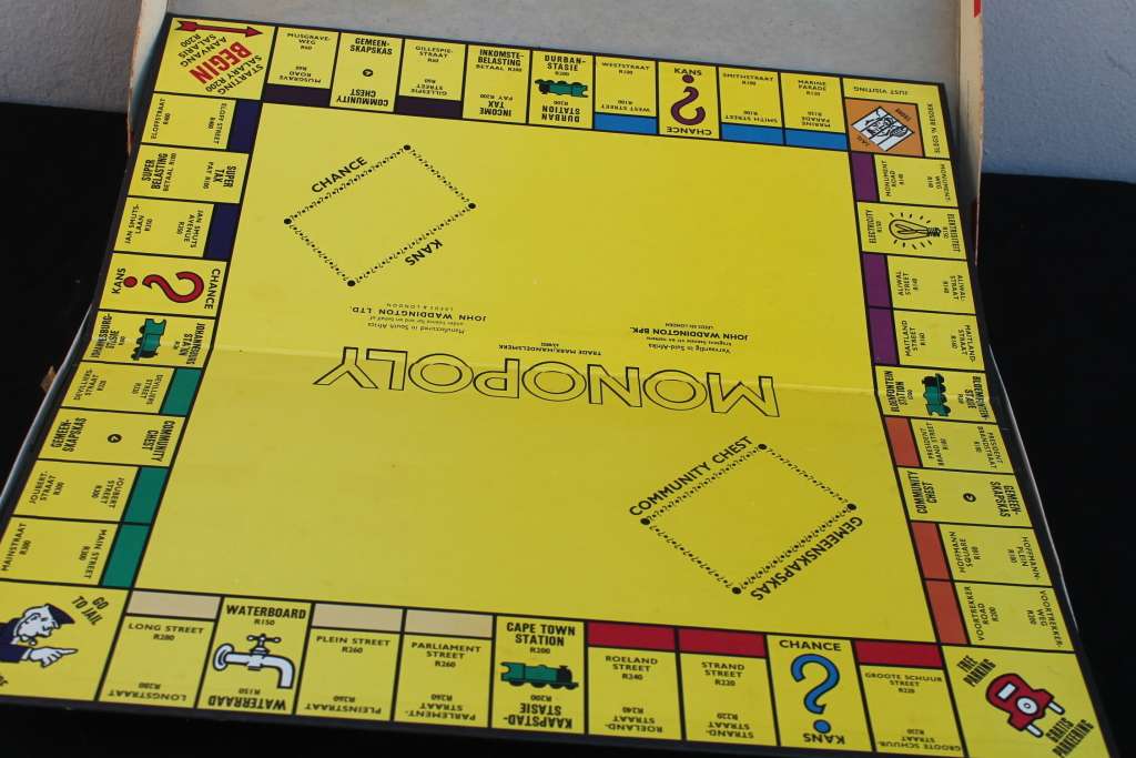 Monopoly has wooden pieces / 2 Boards No 4