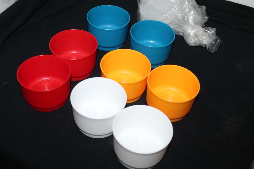 8 Small Tupperware containers