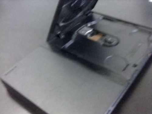 PS2 Console with all its cables + 1 remote