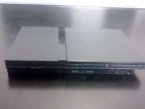PS2 Console with all its cables + 1 remote