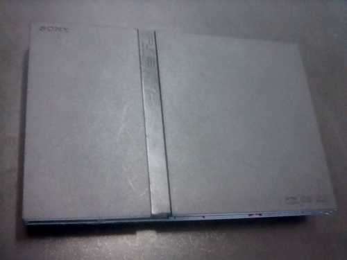 PS2 Console with all its cables + 1 remote