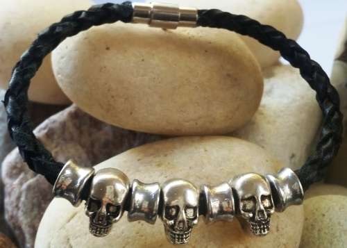 UNISEX BRAIDED GENUINE LEATHER BRACELET WITH TIBETAN SILVER SKULL BEADS