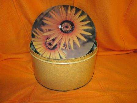 ROUND OLD BISCUIT TIN WITH FLORAL DESIGN~ IN USED BUT GOOD CONDITION~ HAVE A LOOK!!!!!!!