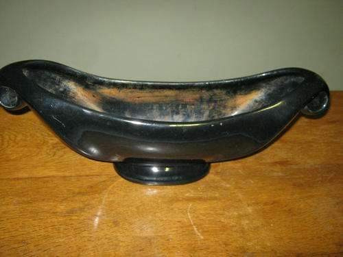 BLACK VASE IN GOOD CONDITION.NO CHIPS OR CRACKS