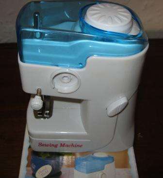 MINI SEWING MACHINE  HAVE A LOOK!!