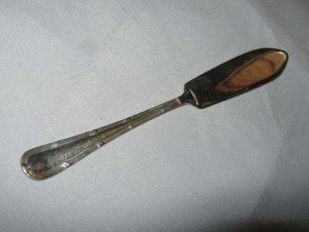 ORNATE BUTTER/PATE KNIFE IN GOOD  CONDITION   HAVE A LOOK!!!