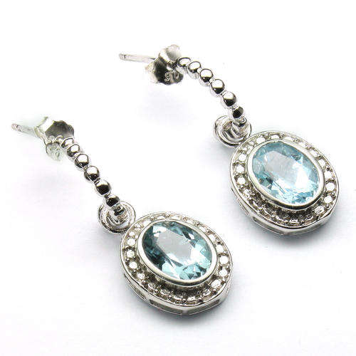 CHARMING 6X8 MM BLUE TOPAZ &  WHITE DIAMOND 0.925 STERLING SILVER W/ PLATINUM EARRINGS
