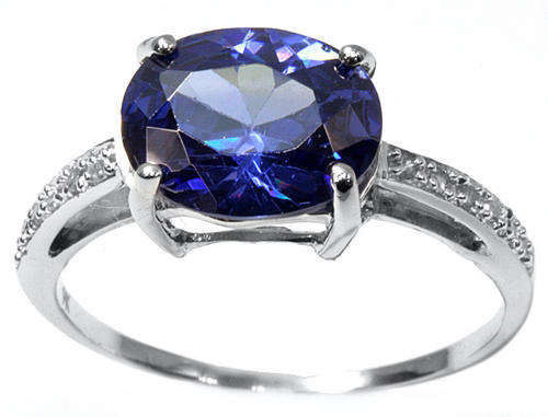 NEW 9KT WHITE GOLD TANZANITE AND DIAMOND RING