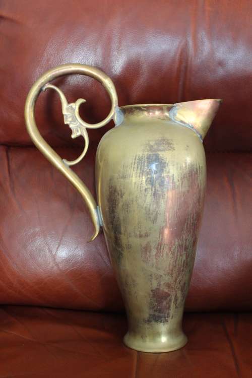 Antique Art Nouveau brass and copper Pitcher with embossed lily in high relief