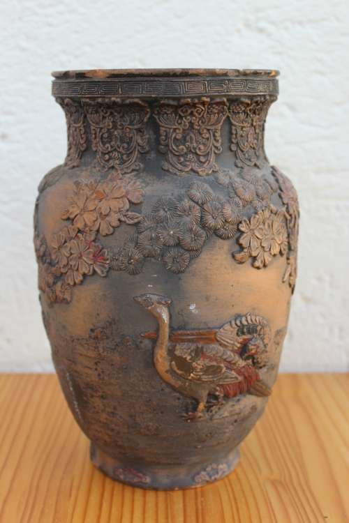 Antique japanese earthenware vase with predatory bird and pheasants in high relief 25cm tall x 15cm