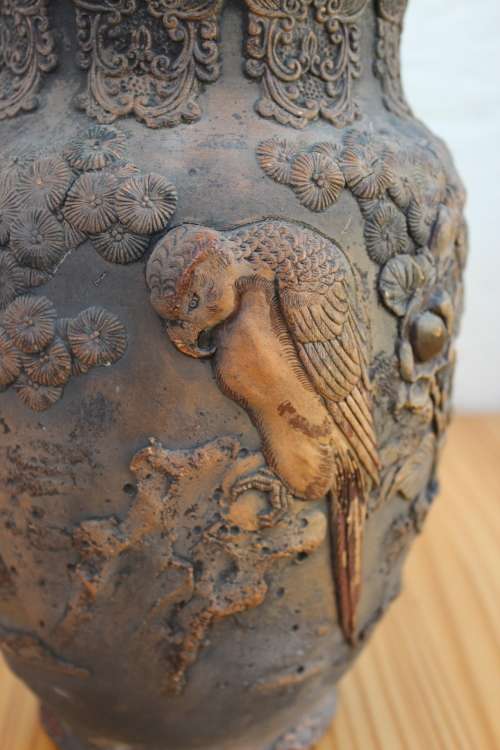 Antique japanese earthenware vase with predatory bird and pheasants in high relief 25cm tall x 15cm