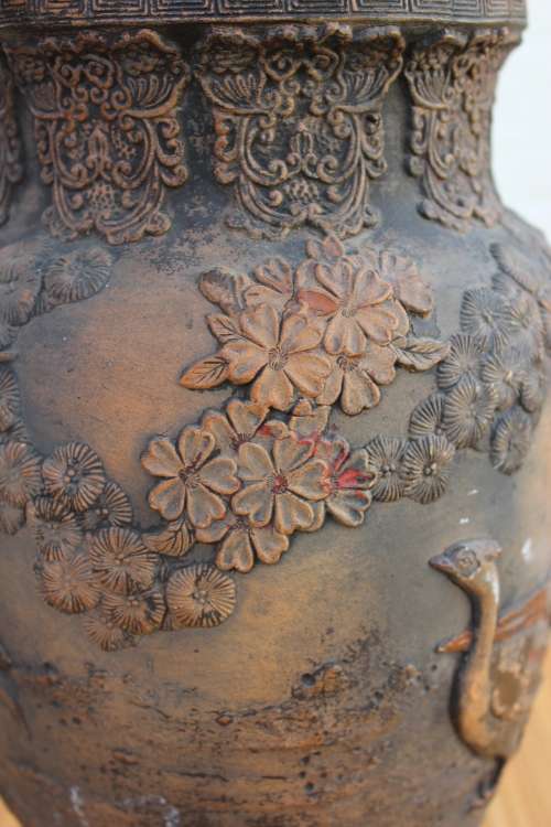 Antique japanese earthenware vase with predatory bird and pheasants in high relief 25cm tall x 15cm