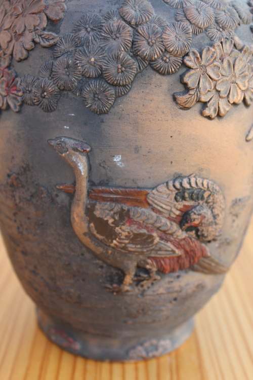 Antique japanese earthenware vase with predatory bird and pheasants in high relief 25cm tall x 15cm