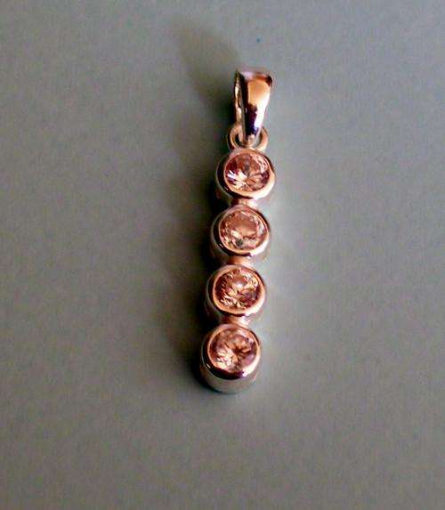 STUNNING Simulated Diamonds pendant set in Sterling Silver