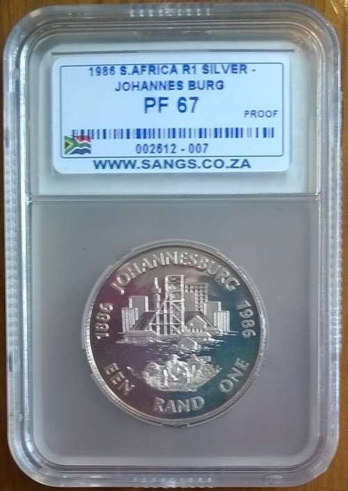 1986 RSA SILVER JOHANNESBURG (1886-1986) R1 SANGS SLABBED PROOF 67 HIGH GRADE!!!!!