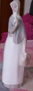 PORCELAIN LADY FIGURINE