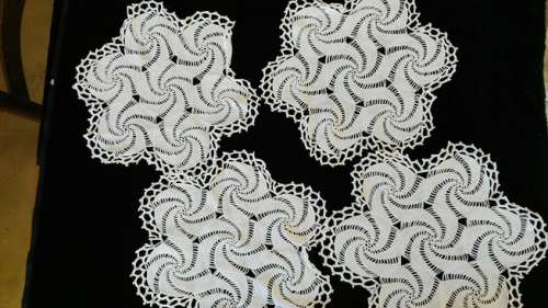 Set of 4 white crochet doilies