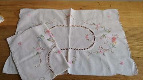 Two machine embroidered place mats/ tray cloths