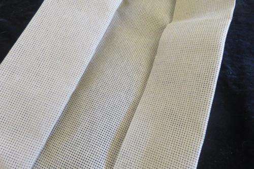 Piece of tapestry canvas