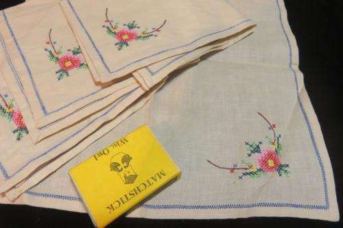 Four small embroidered napkins - cross stitch