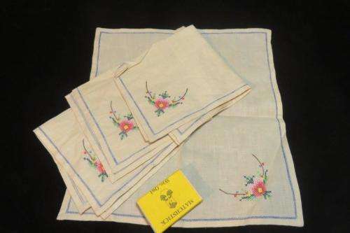 Four small embroidered napkins - cross stitch